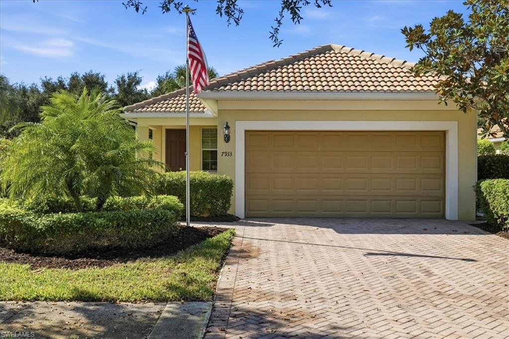 7933 Guadiana Way Ave Maria, FL 34142 - Photo 1 of 50 a front view of a house