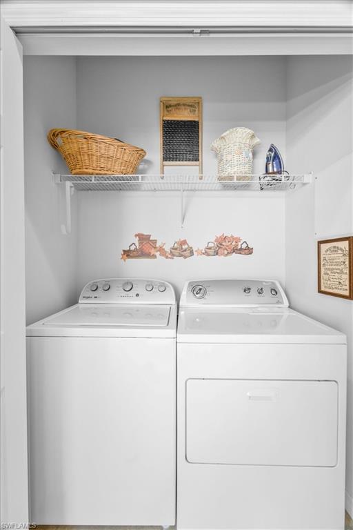 7933 Guadiana Way Ave Maria, FL 34142 - Photo 28 of 50 a utility room with dryer and washer