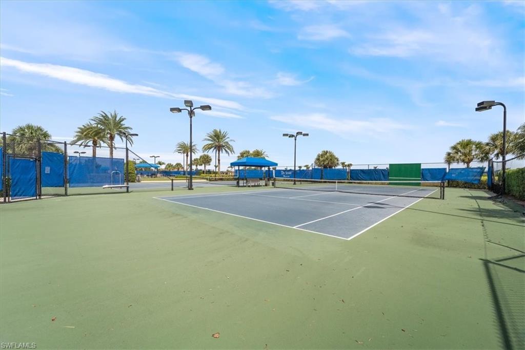7933 Guadiana Way Ave Maria, FL 34142 - Photo 46 of 50 a view of a tennis court