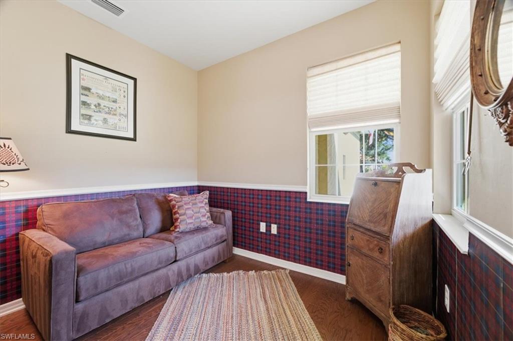 7933 Guadiana Way Ave Maria, FL 34142 - Photo 7 of 50 a living room with furniture