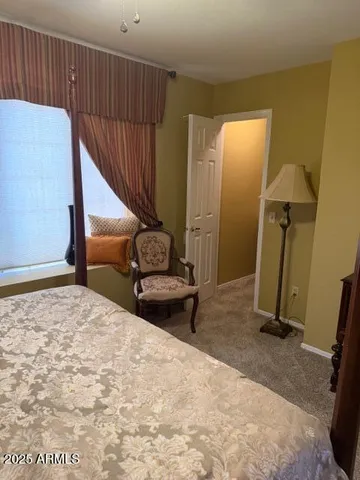 a view of a room with wooden floor and stairs