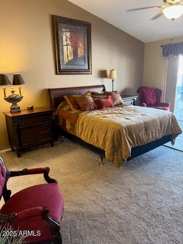 a spacious bedroom with a bed and window