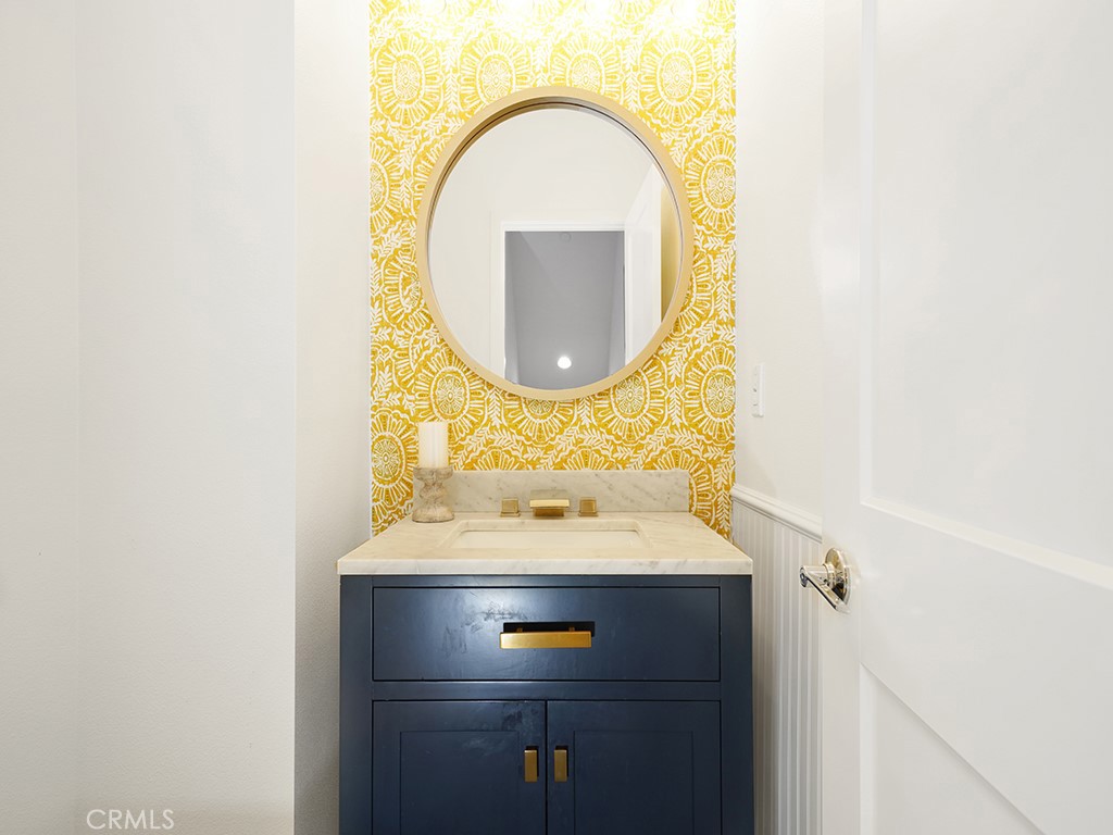 603 Shadowbrook Lake Forest, CA 92610 - Photo 11 of 23 a bathroom with a sink and a mirror