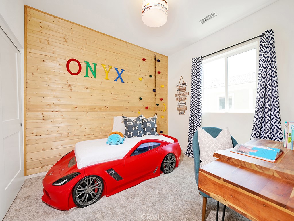 603 Shadowbrook Lake Forest, CA 92610 - Photo 15 of 23 a bedroom with a bed and a table