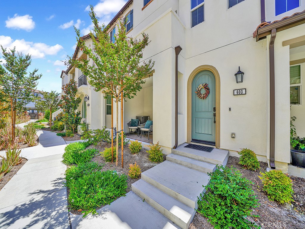 603 Shadowbrook Lake Forest, CA 92610 - Photo 23 of 23 a front view of a house with garden