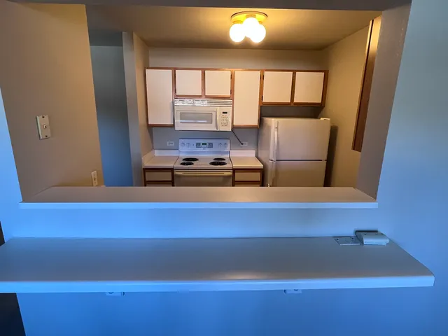 a room with furniture and window