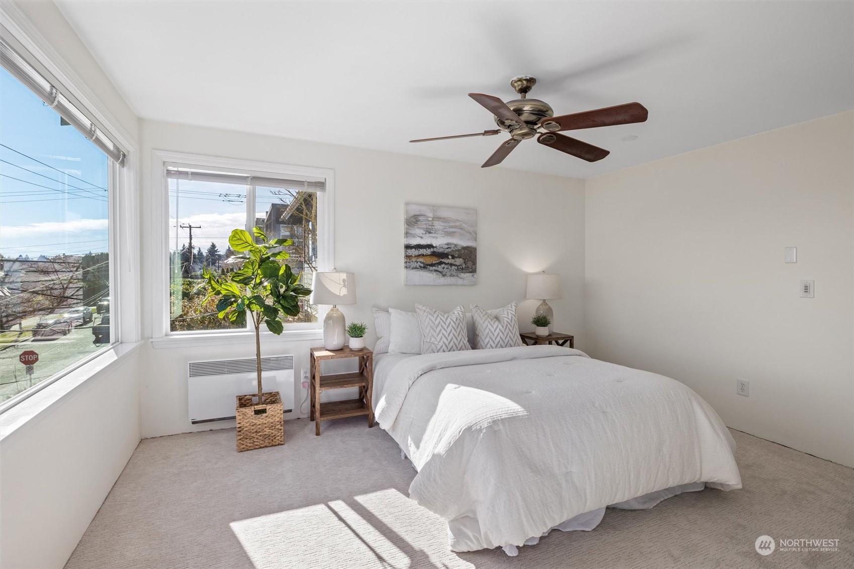 7209 Dayton Avenue North Seattle, WA 98103 - Photo 17 of 33 a bedroom with a bed furniture and a window