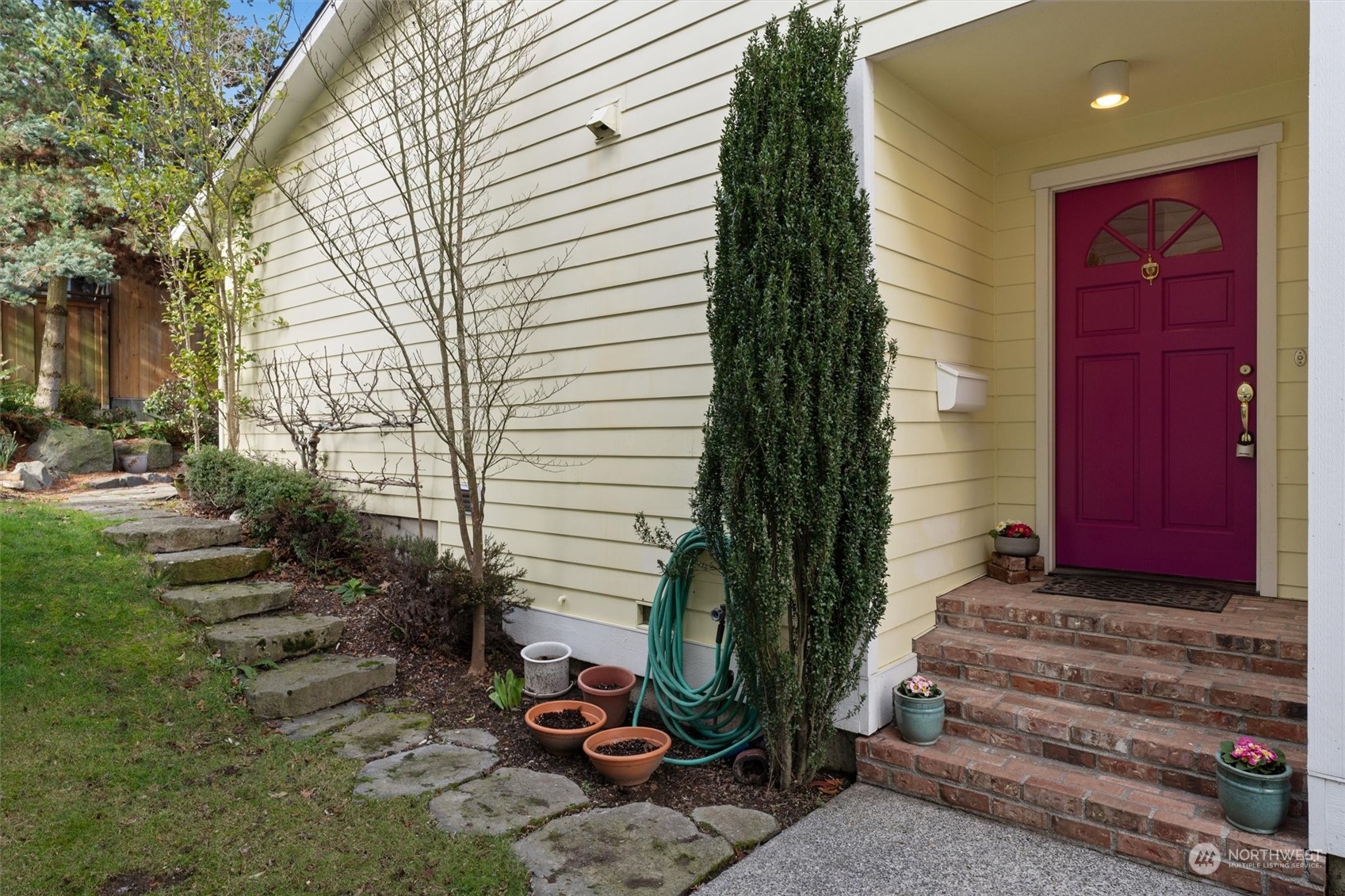 7209 Dayton Avenue North Seattle, WA 98103 - Photo 2 of 33 a view of a house with backyard and sitting area