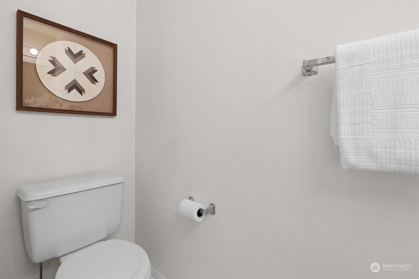 7209 Dayton Avenue North Seattle, WA 98103 - Photo 23 of 33 a white toilet sitting next to a white wall