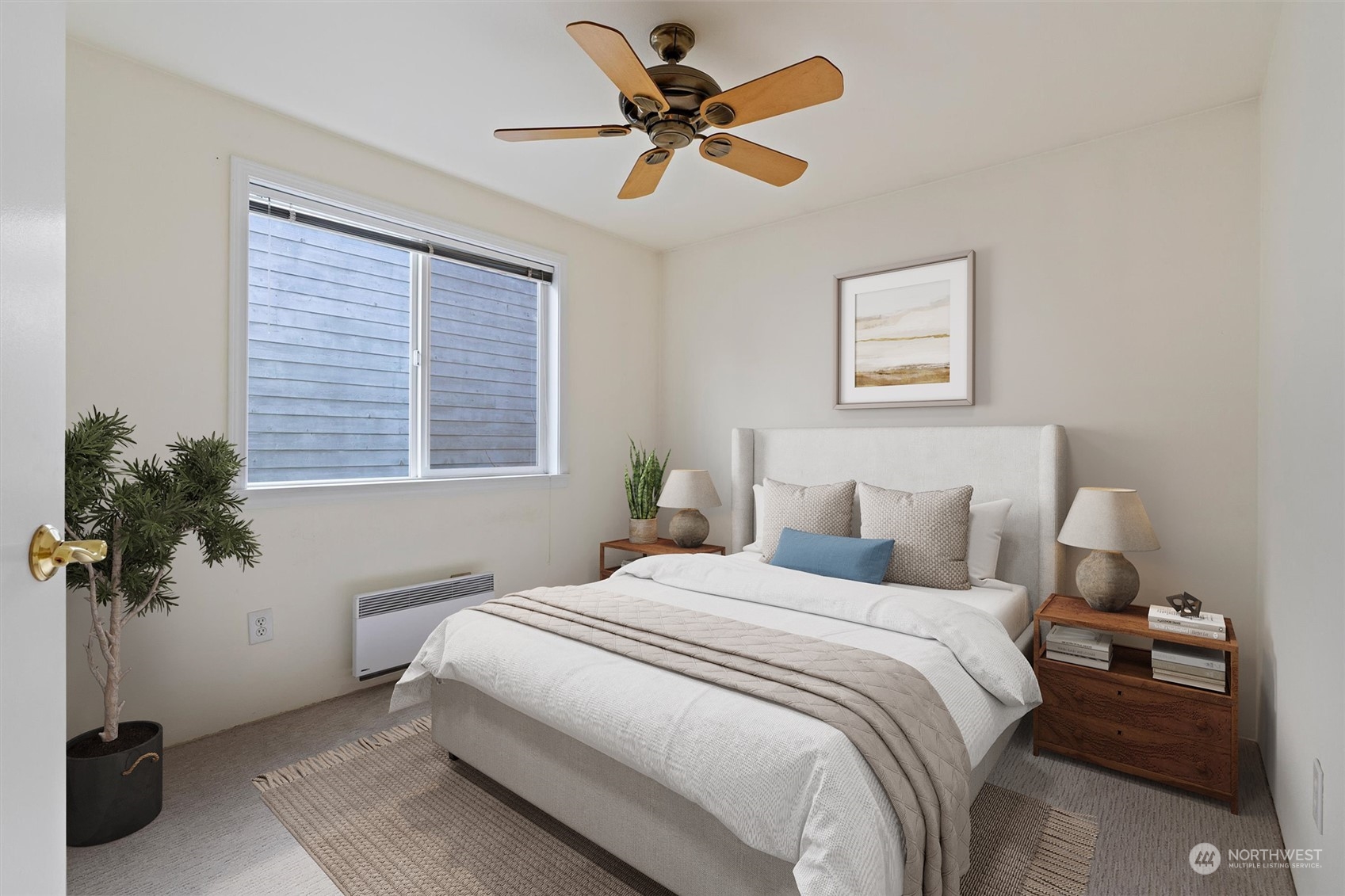 7209 Dayton Avenue North Seattle, WA 98103 - Photo 24 of 33 a bedroom with a bed and a potted plant