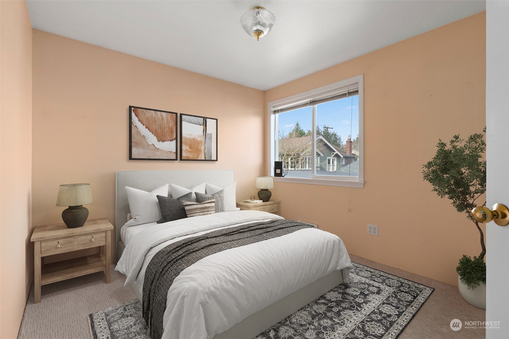 7209 Dayton Avenue North Seattle, WA 98103 - Photo 25 of 33 a bedroom with a bed and a painting on the wall