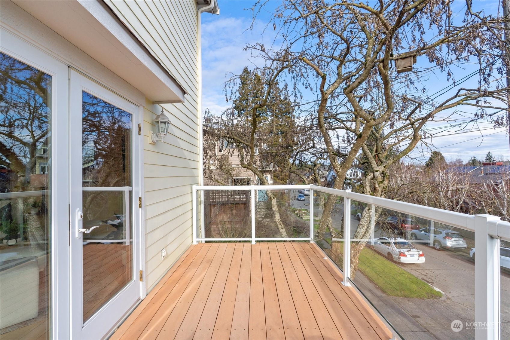 7209 Dayton Avenue North Seattle, WA 98103 - Photo 27 of 33 a view of balcony with wooden floor and fence