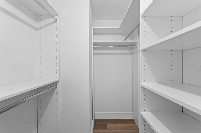 a view of an empty walk in closet