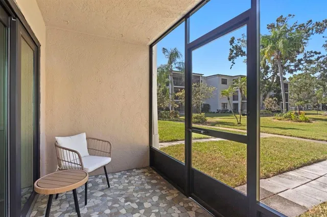 a view of a brick building with many windows