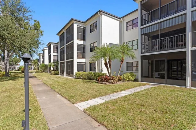 front view of a house with a swimming pool