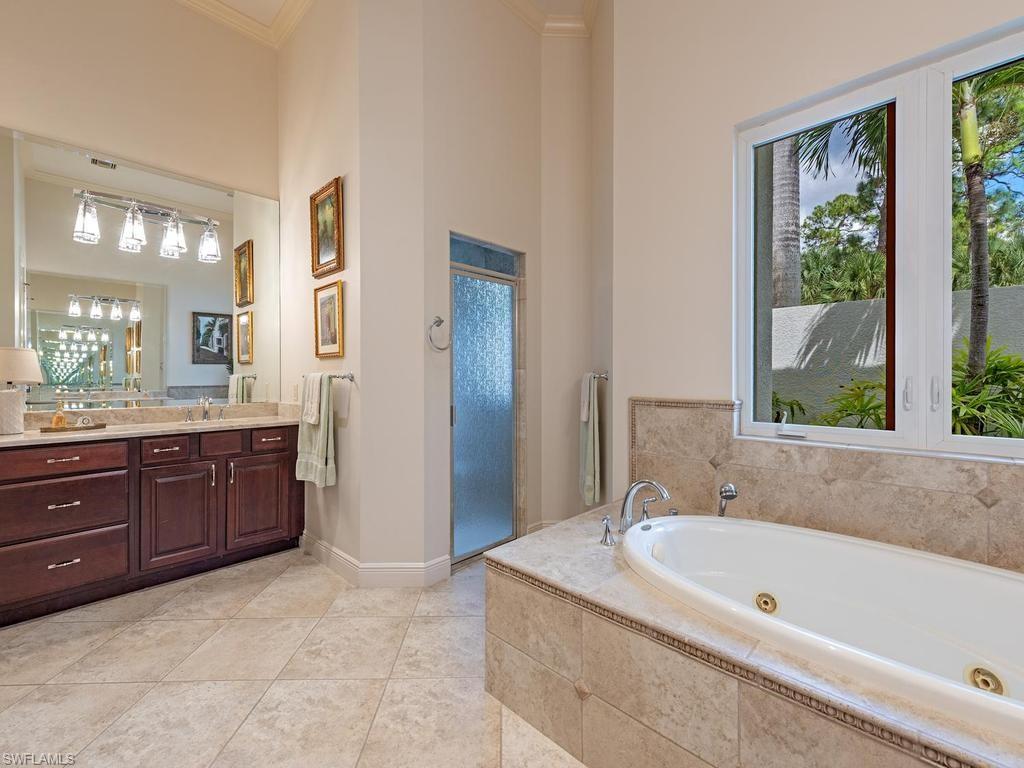 5140 Tamarind Ridge Drive Naples, FL 34119 - Photo 15 of 25 Bedroom 1 with private bath.