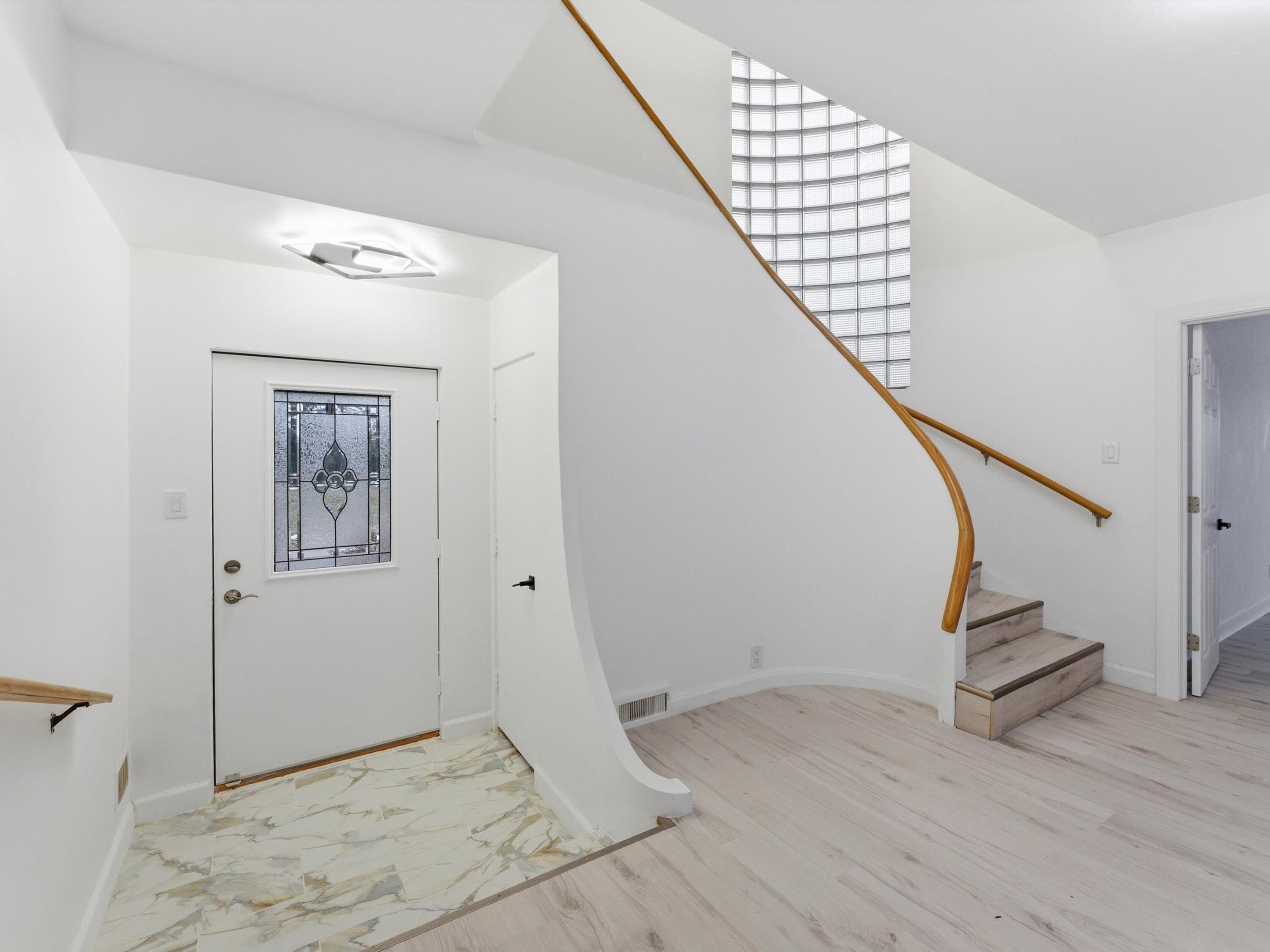 1608 North Rapids Road Manitowoc, WI 54220 - Photo 20 of 72 Foyer and Stairs to 2nd floor