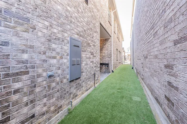 a view of a patio in back of a house