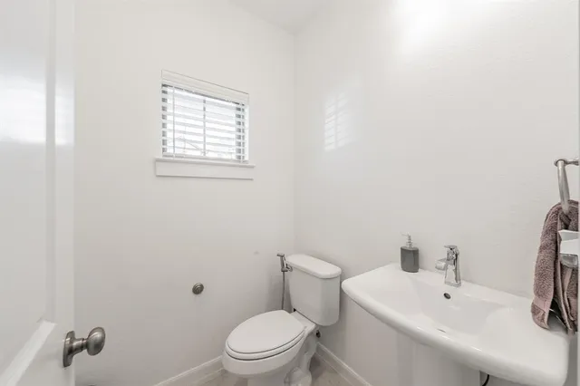 a view of storage and utility room with racks on the wall