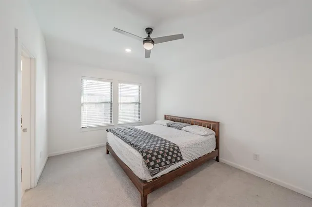 a bathroom with double sink and a mirror