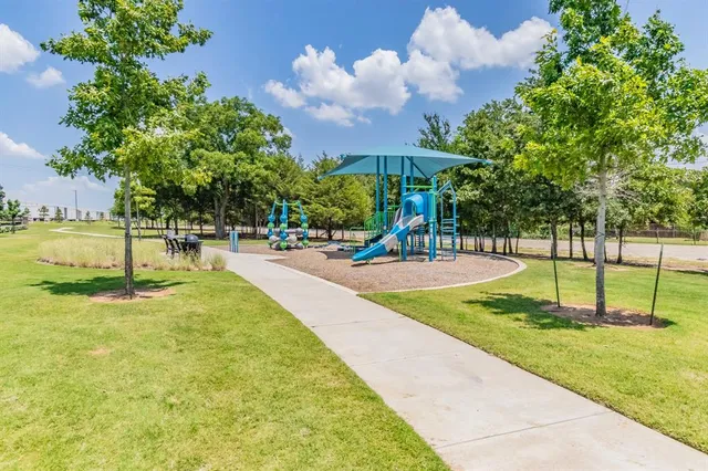 a view of swimming pool with garden