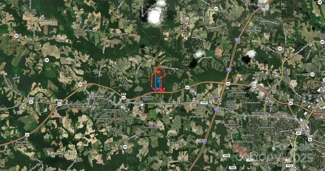 a view of swimming pool with a backyard