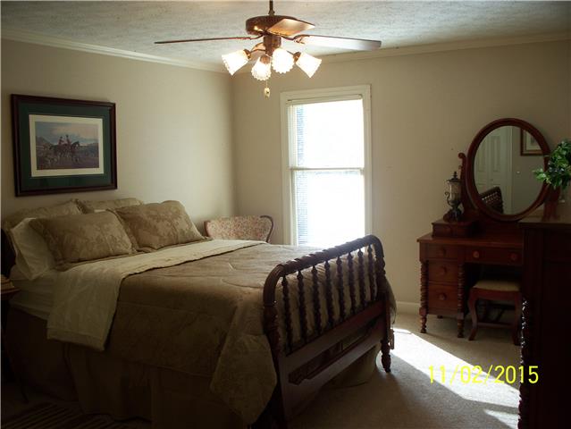 4809 Manners Road Lebanon, TN 37087 - Photo 14 of 19 a bedroom with a bed and a window