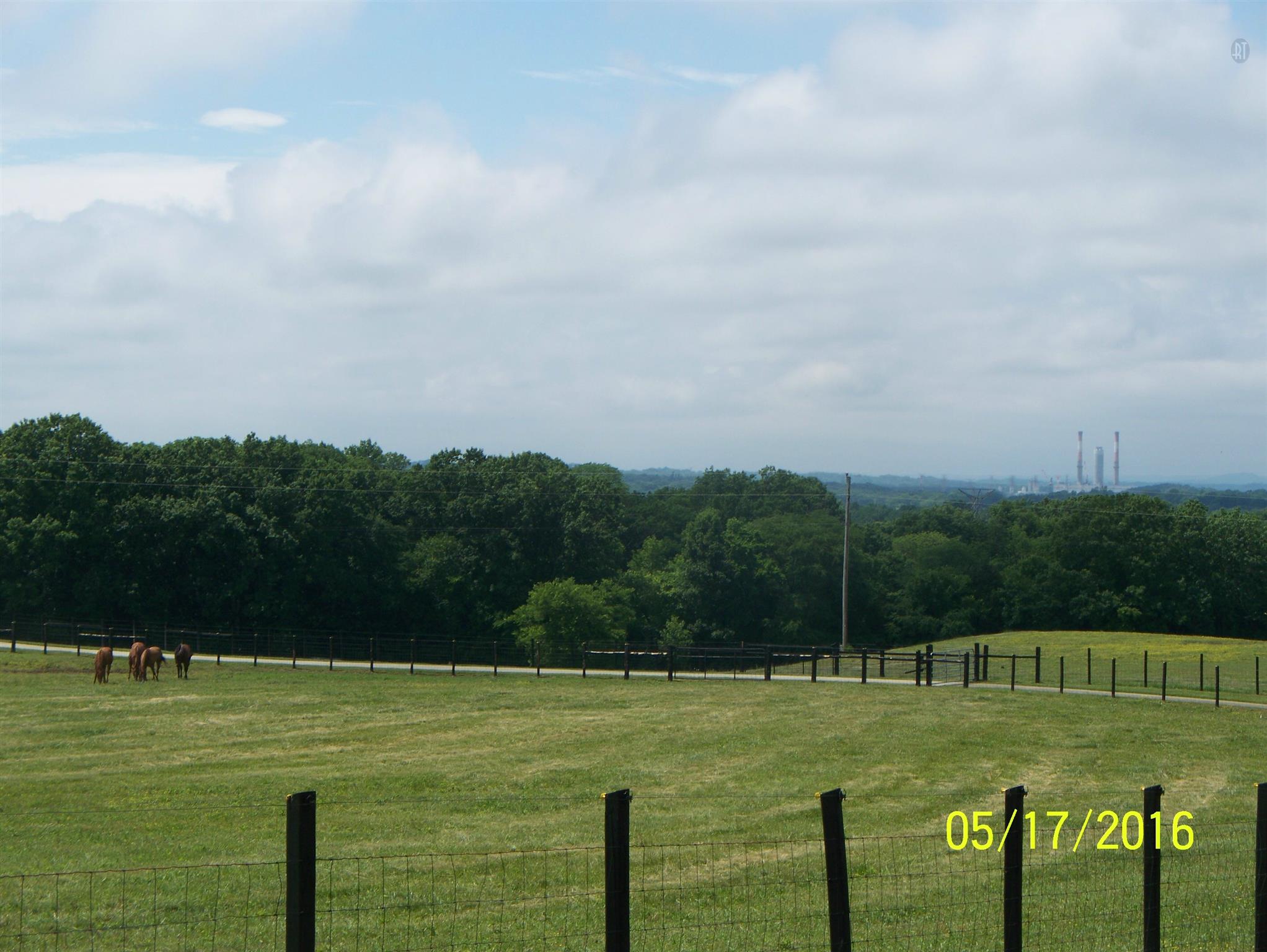 4809 Manners Road Lebanon, TN 37087 - Photo 19 of 19 a view of a golf course with a lake