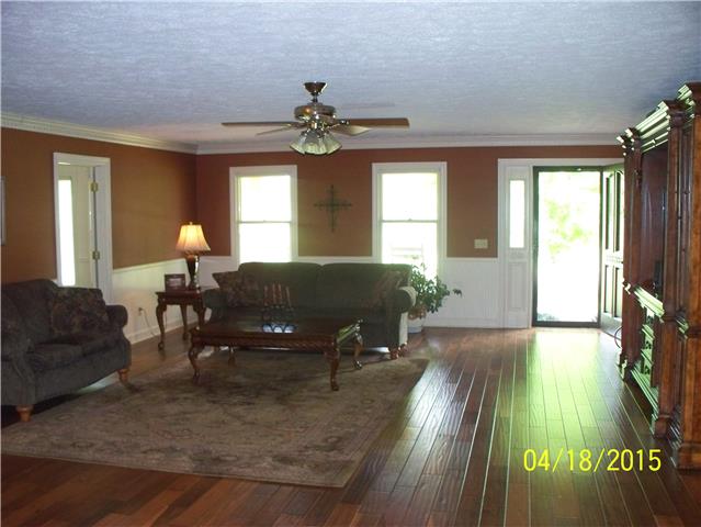 4809 Manners Road Lebanon, TN 37087 - Photo 8 of 19 a living room with furniture and a chandelier