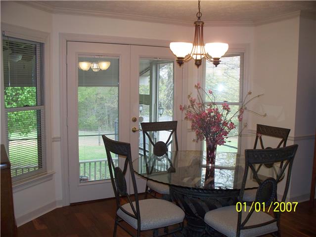 4809 Manners Road Lebanon, TN 37087 - Photo 10 of 19 a view of a dining room with furniture window and wooden floor