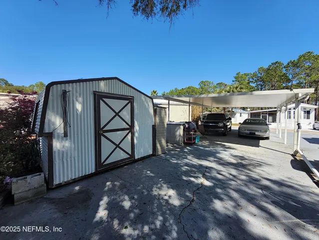 a view of house with outdoor space and seating area