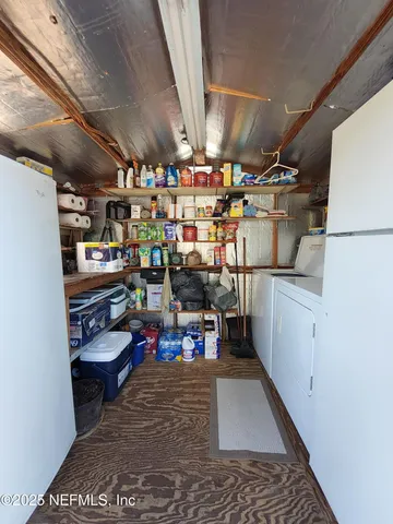 a view of a lake with a house