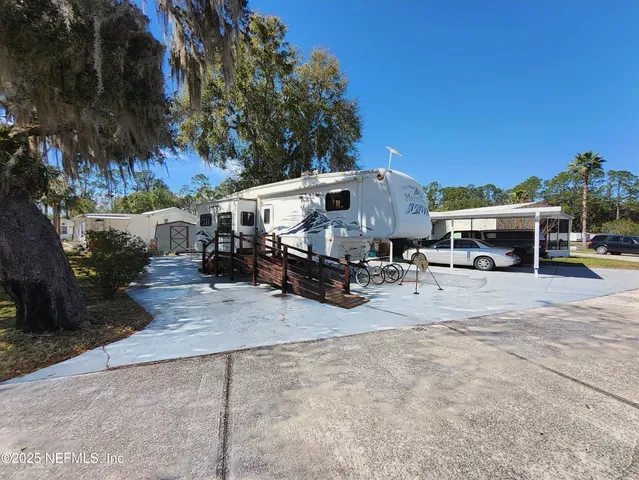 a view of a house with sitting area