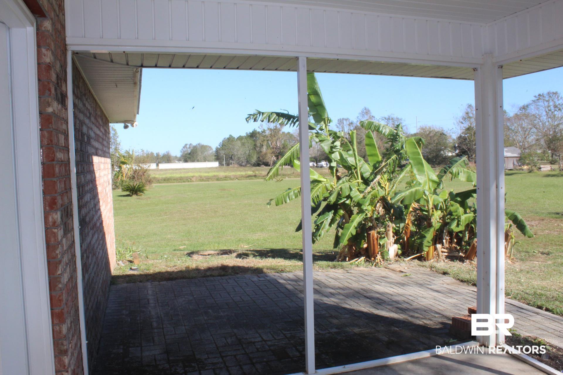 17717 East View Loop Foley, AL 36535 - Photo 15 of 19 Screened Porch