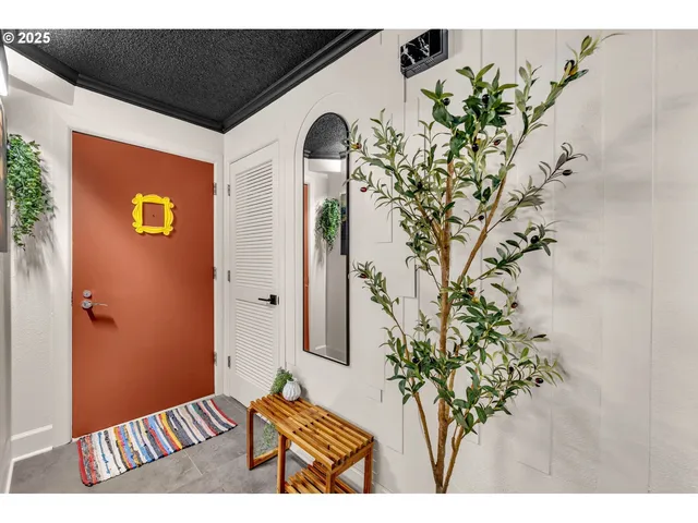 a view of entryway with wooden floor