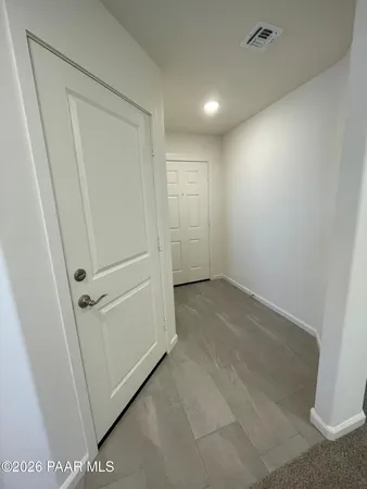 an empty room with a empty space and window