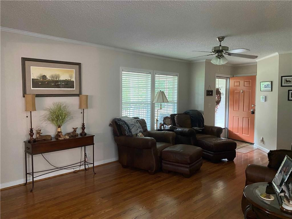 383 Gillis Road Roxboro, NC 27574 - Photo 3 of 19 a living room with furniture and a window