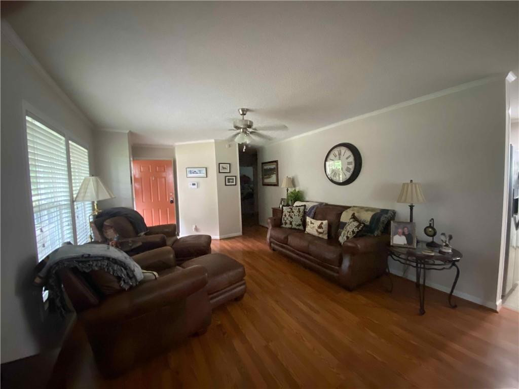 383 Gillis Road Roxboro, NC 27574 - Photo 4 of 19 a living room with furniture and a large window