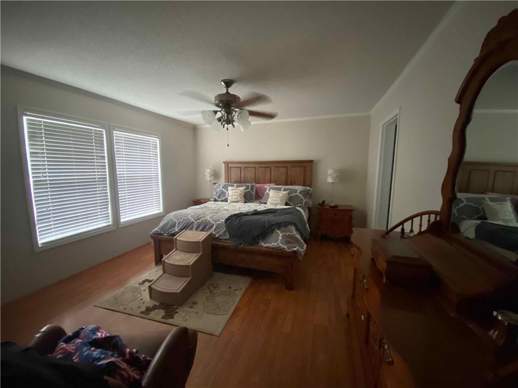 383 Gillis Road Roxboro, NC 27574 - Photo 9 of 19 a bedroom with furniture and a window