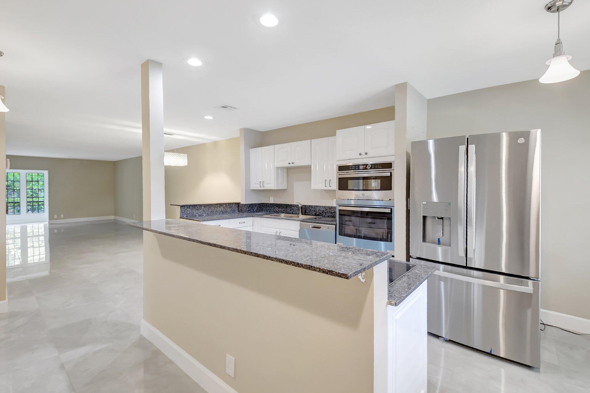 1401 Northwest 15th Avenue, Unit 1 Boca Raton, FL 33486 - Photo 3 of 34 3-web-or-mls-DSC_2291