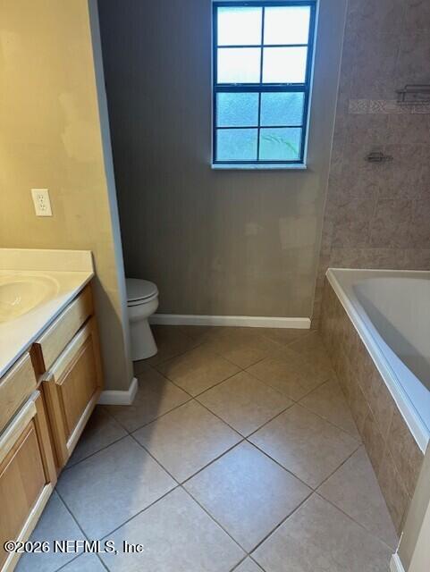 45035 Hartford Court Callahan, FL 32011 - Photo 15 of 30 a bathroom with a toilet and a bathtub