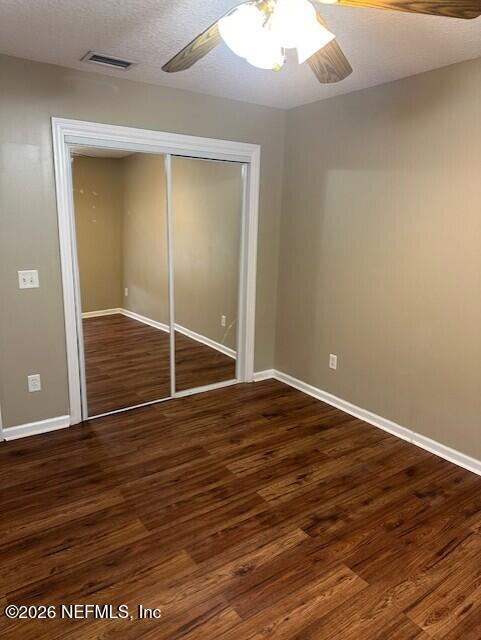 45035 Hartford Court Callahan, FL 32011 - Photo 17 of 30 an empty room with wooden floor and windows