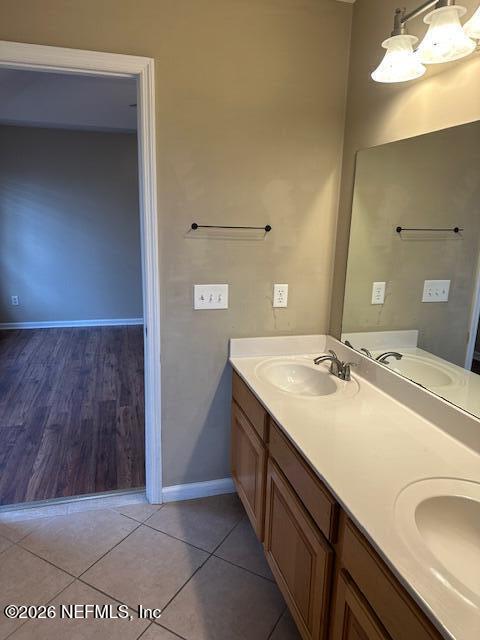 45035 Hartford Court Callahan, FL 32011 - Photo 18 of 30 a bathroom with a sink and a mirror