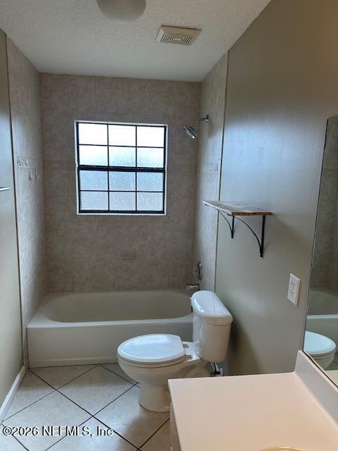 45035 Hartford Court Callahan, FL 32011 - Photo 22 of 30 a bathroom with a toilet a sink and bathtub