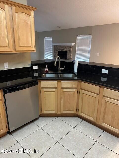 45035 Hartford Court Callahan, FL 32011 - Photo 24 of 30 a kitchen with granite countertop a sink a stove and cabinets