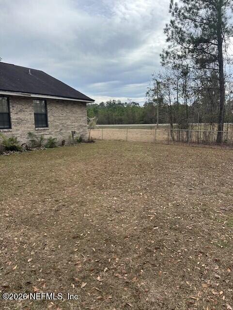 45035 Hartford Court Callahan, FL 32011 - Photo 28 of 30 a backyard of a house