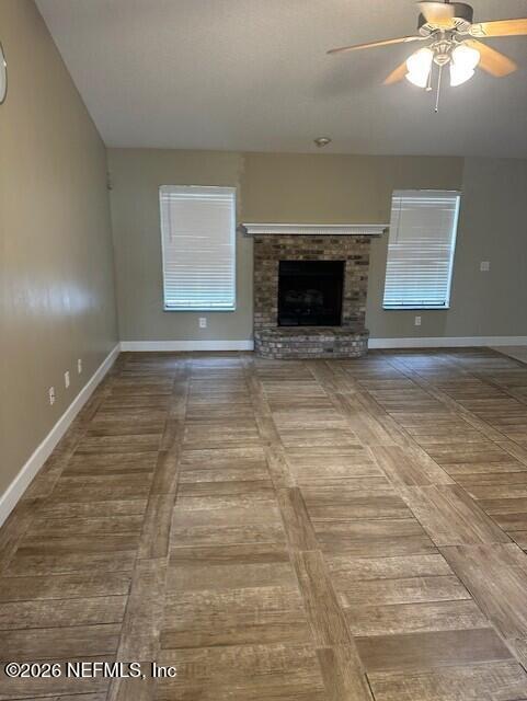 45035 Hartford Court Callahan, FL 32011 - Photo 4 of 30 a view of empty room with fireplace and fan