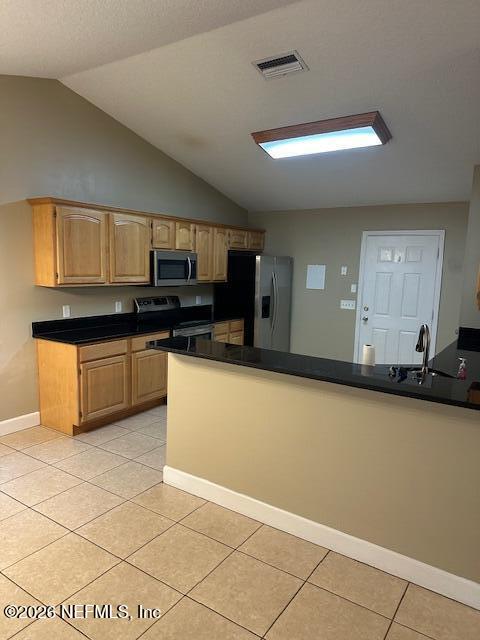45035 Hartford Court Callahan, FL 32011 - Photo 8 of 30 a kitchen with stainless steel appliances granite countertop a sink and cabinets