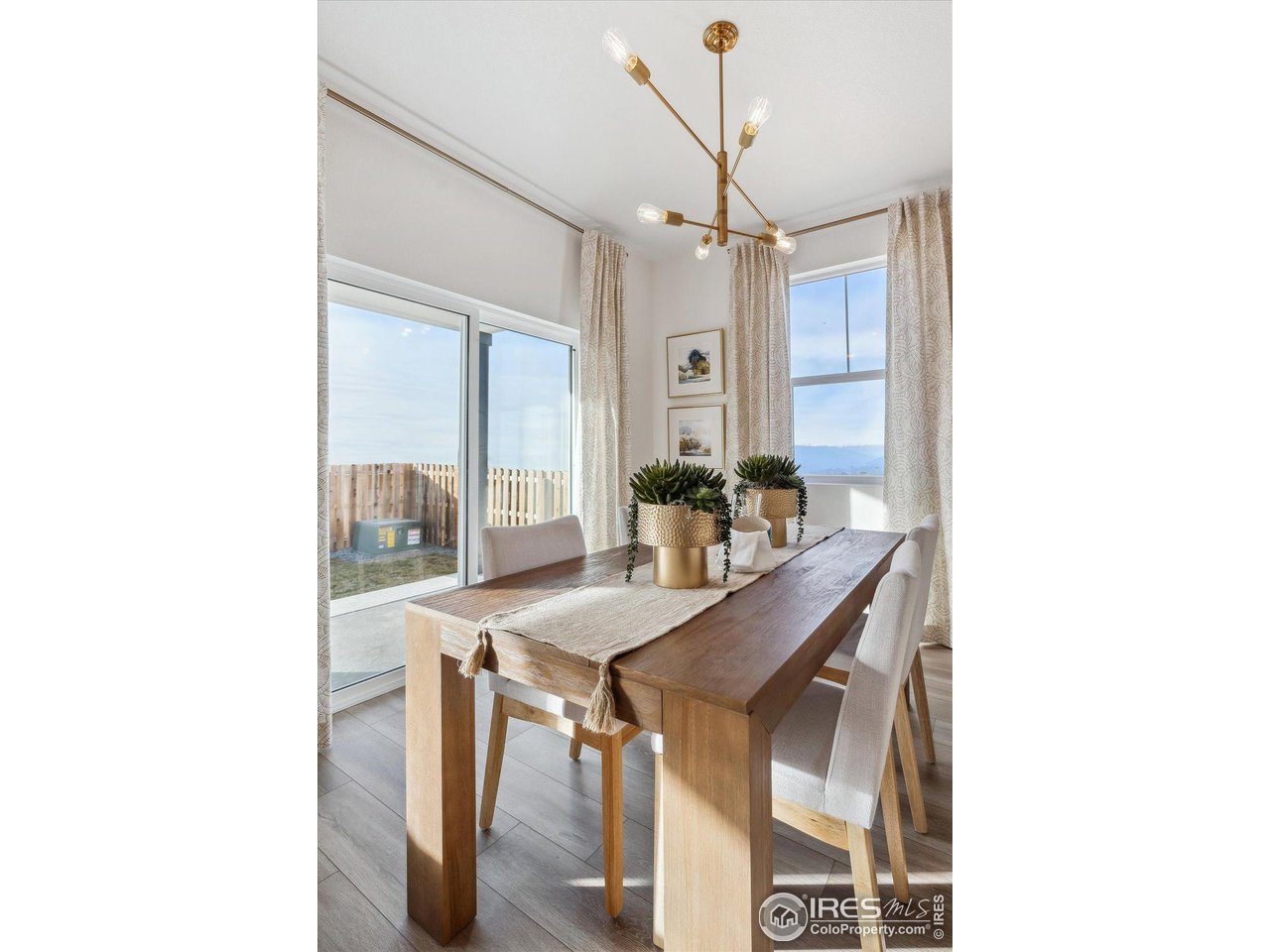 2303 Base Street Fort Lupton, CO 80621 - Photo 15 of 26 a view of a dining room with furniture