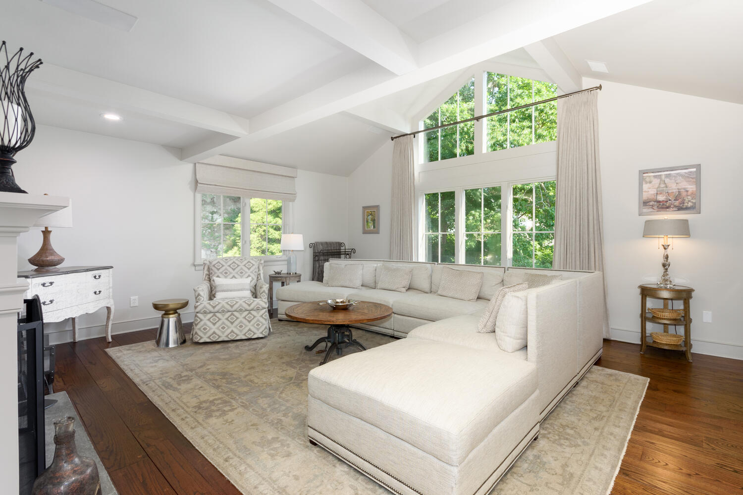 79 Rings End Road Darien, CT 06820 - Photo 19 of 42 a living room with furniture and a large window